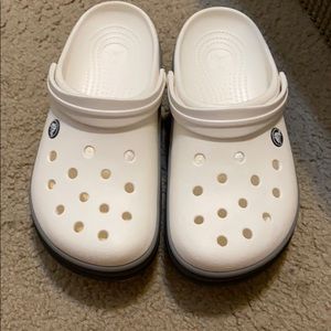 white with three grey strips on the side crocs